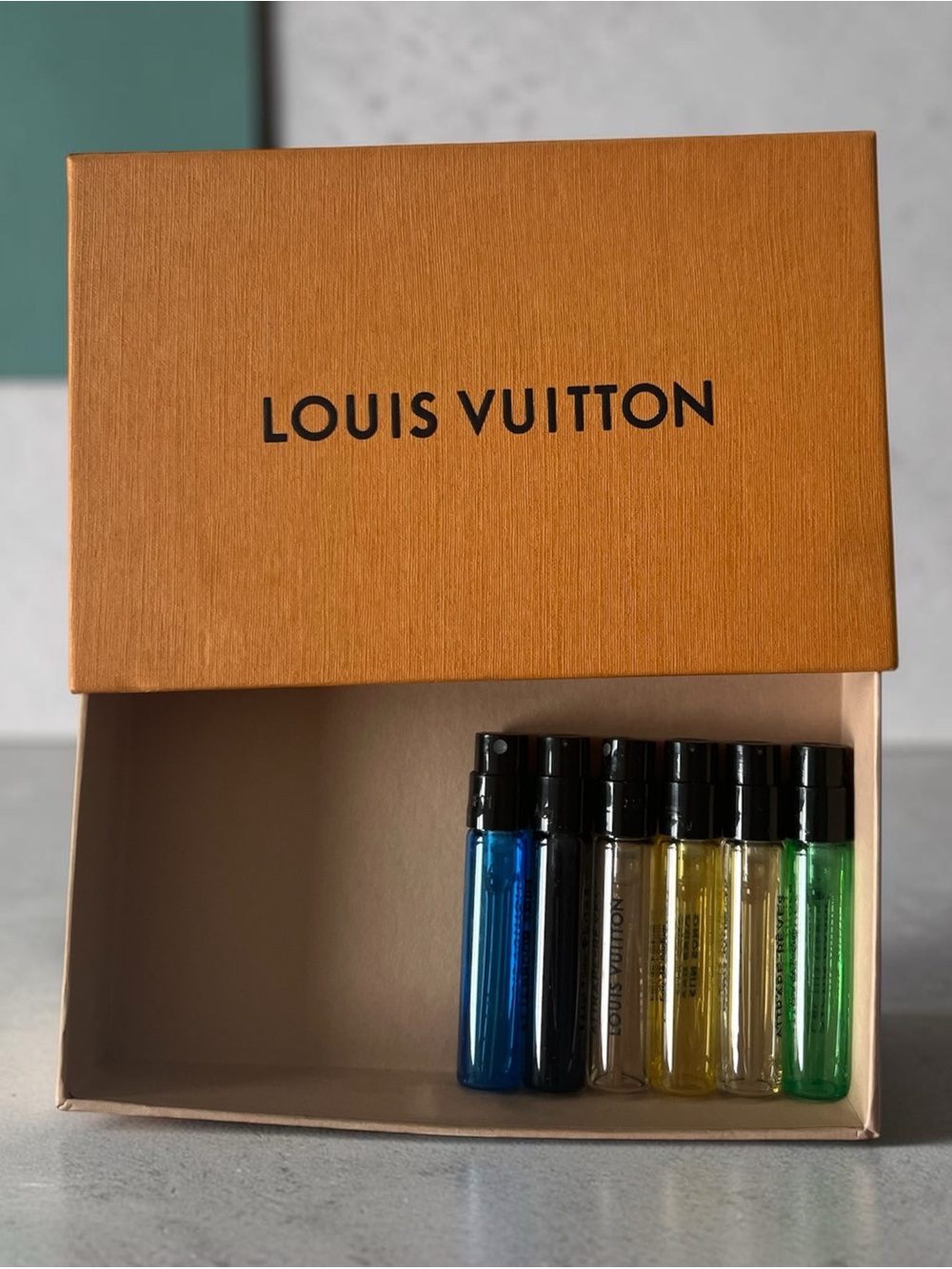Louis Vuitton Orange Box with 6 perfumes one is discontinued